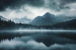 Reflecting Lake Surrounded by Forest and Mountains Under Moody Cloudy Sky photo