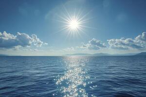 Ocean Water Sparkling Under Bright Sunlight with Blue Sky and Clouds photo