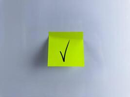 Making important decision and marking success with check mark photo