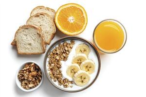 Enjoying a Nutritious Breakfast with Bread, Orange Juice, and Yogurt photo