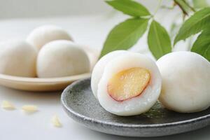 Delicious Mochi Ice Cream with Fruit Filling on a Plate photo