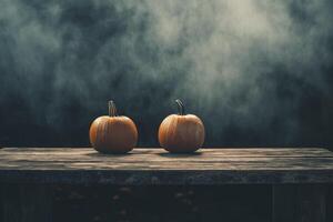 Two Pumpkins on a Rustic Wood Table with Foggy Background photo