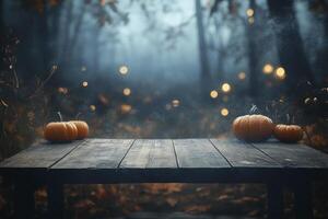 Pumpkins on Wooden Table with Foggy Forest Background for Autumn Display photo