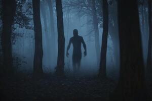 Figure Walking in Foggy Forest at Night with a Spooky Mood photo