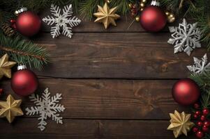 Christmas Ornaments on Wooden Surface with Evergreen and Snowflakes Decoration photo