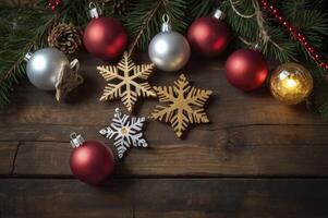 Arrangement of Christmas Ornaments and Snowflakes on Wooden Surface photo