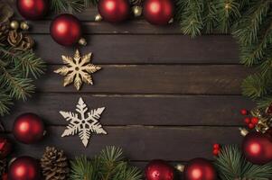 Creating Christmas Decoration Frame with Ornaments Pinecones and Evergreen Branches photo