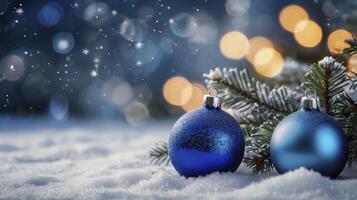 Blue Christmas Ornaments on Snow with Bokeh Lights Festive Holiday Season photo