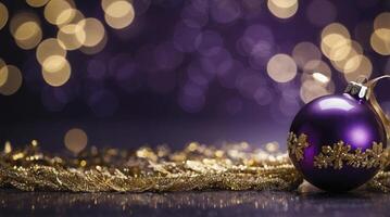 Festive Purple Christmas Ornament with Gold Garland and Bokeh Background photo