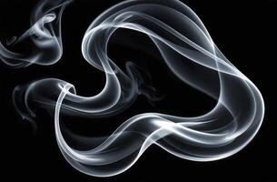 Elegant White Smoke Trails Flowing Against a Black Background photo