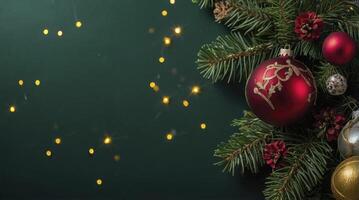 Christmas Ornaments and Pine Branches on Green Background with Lights photo