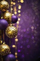 Festive Hanging Christmas Ornaments in Gold and Purple with Bokeh Lights photo
