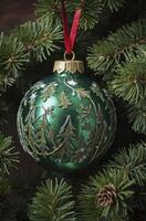 Hanging Green Christmas Ornament Decorated with Golden Trees on Fir Branch photo