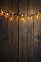 Hanging Warm String Lights on Rustic Wooden Background for Festive Design photo