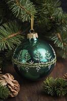 Green Christmas Ornament Hanging on Tree with Pine Cones Decoration photo