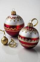 Elegant Christmas Ornaments with Red and Gold Decoration on White Background photo