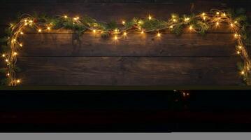 Christmas Garland with Lights on Rustic Wood Background for Festive Decor photo