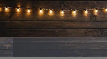 String Lights Glowing Against Rustic Wooden Wall for Festive Celebrations photo