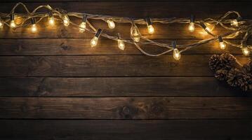 String Lights and Pine Cones on a Rustic Wooden Background photo