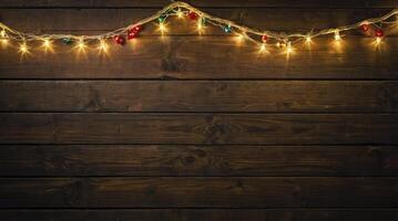 Festive Glowing Christmas Lights Hanging on Dark Wooden Background Backdrop photo