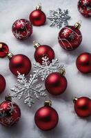 Festive Red Christmas Ornaments and Silver Snowflakes on Fluffy White Snow photo