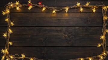 Festive Star String Lights Frame on Dark Wood Background for Christmas photo