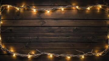 Festive Glowing String Lights on Rustic Wooden Background for Celebration photo