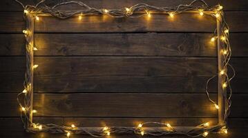Illuminated String Lights Bordering Dark Wood for Festive Holiday Display photo