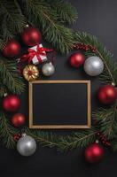 Christmas Decoration with Frame Fir Branches and Ornaments on Black Background photo
