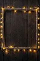Rustic Wooden Frame Adorned with Festive String Lights on Dark Wood photo