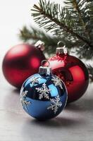 Festive Christmas Ornaments with Snowflake Decor and Pine Branch Still Life photo