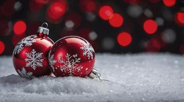 Festive Red Christmas Ornaments with Snowflakes on Snowy Background with Bokeh photo