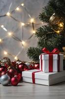 Christmas Gift Boxes Under Decorated Tree with Twinkling Lights photo
