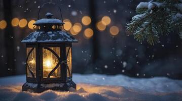 Winter Lantern Glowing in Snow with Bokeh Lights and Falling Snow photo