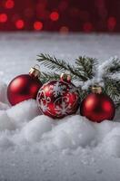 Red Christmas Ornaments with Snowflake Design on Snow Covered Branch photo
