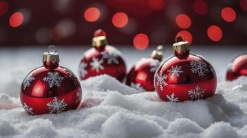 Red Christmas Ornaments with Snowflakes Lying in Snow Festive Holiday Season photo
