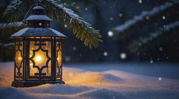Illuminated Lantern on Snowy Ground with Evergreen Branch in Winter photo