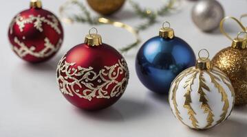 Festive Christmas Ornaments in Red Blue Gold and White on Display photo