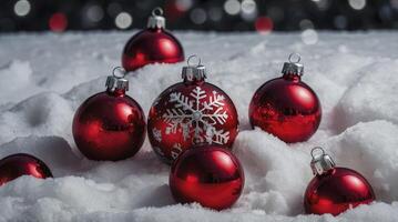 Red Christmas Ornaments Sparkling in the Snow with Holiday Light Background photo
