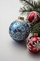 Festive Christmas Ornaments with Silver Design on Evergreen Branch Close Up photo