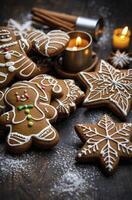 Gingerbread Cookies with Decorative Icing Arranged Near Candles and Cinnamon Sticks photo