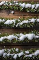 Evergreen Branches Covered in Fresh Snow on Rustic Wooden Surface photo