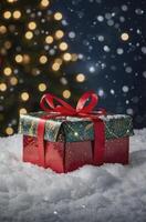 Festive Gift Box with Red Ribbon in Snow Under Christmas Lights photo