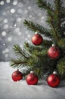 Decorating Christmas Tree with Red Ornaments in a Snowy Winter Scene photo