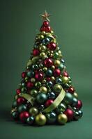 Decorated Christmas Tree with Red and Green Ornaments Against Green Background photo