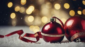 Festive Red Christmas Ornaments with Ribbon on Snowy Background photo
