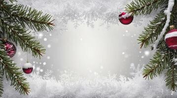 Festive Christmas Background with Pine Branches, Ornaments, and Falling Snow photo