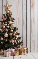 Decorated Christmas Tree with Gifts and Elegant Ornaments on Wooden Background photo