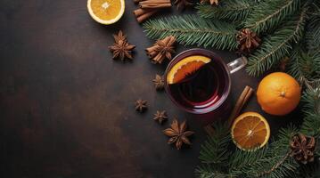 Enjoying Mulled Wine with Orange and Spices for Holiday Warmth photo