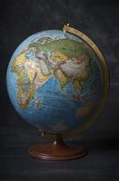 Classic World Globe with Detailed Continents on Stand Exploring Geography photo